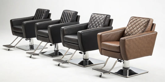 A row of modern reclining hydraulic salon chairs with quilted upholstery and chrome bases.