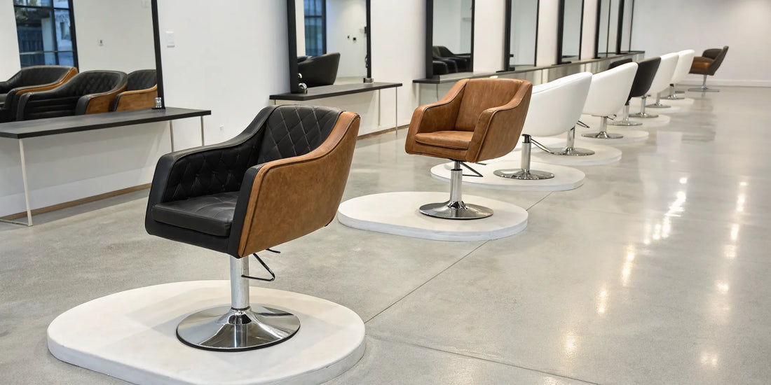 A modern and adjustable hair cutting chair for a professional stylist.