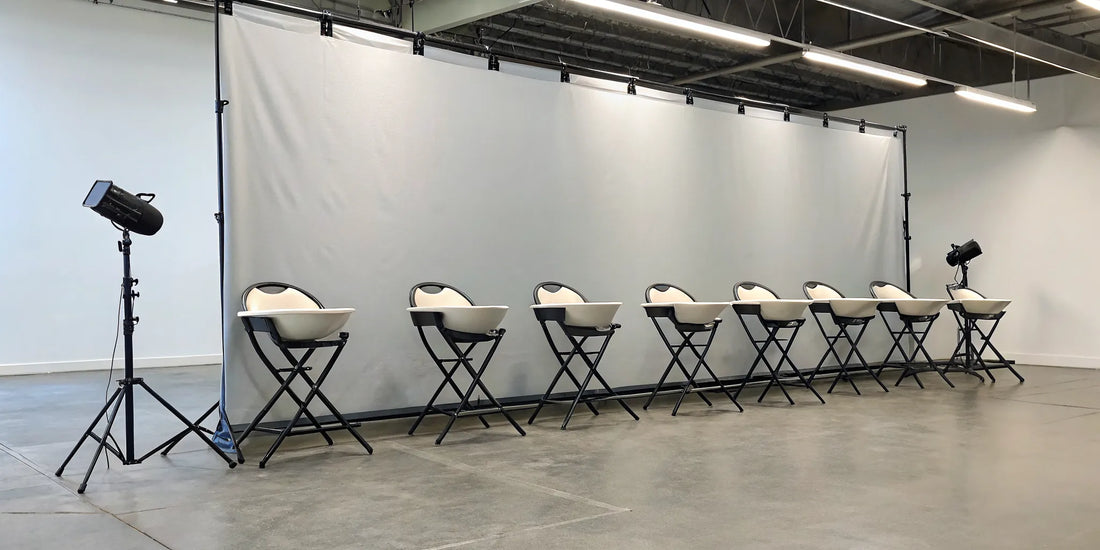 A row of the best portable shampoo chairs for professional stylists in a salon.