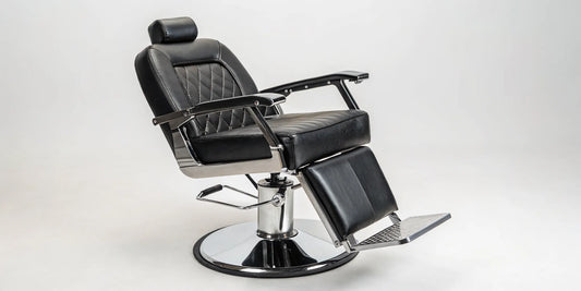 A reclining hydraulic styling chair for a professional barber shop, beauty salon, or spa.