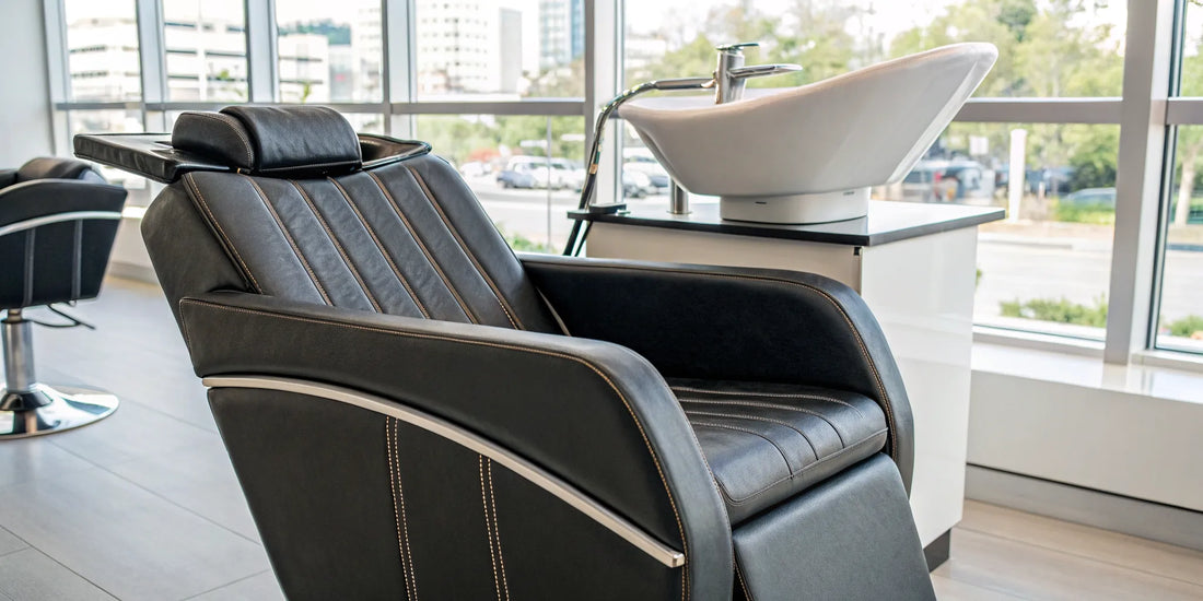 A modern and comfortable salon chair with an integrated shampoo bowl.