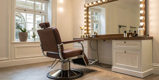 A reclining all-purpose salon chair with a hydraulic lift and adjustable headrest.