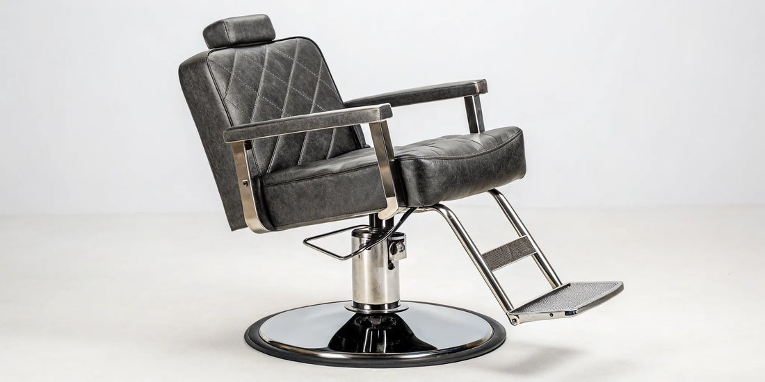 Professional heavy duty all purpose salon chair with a hydraulic base, reclining back, and footrest.