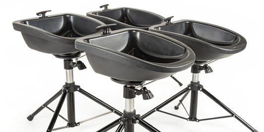 Portable shampoo bowls with adjustable stands for mobile and salon use.